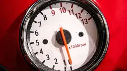 Motorcycle tachometer closeup showing the RPM dial used for launch control