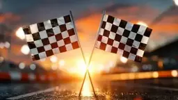 Checkered racing flags against a sunset sky
